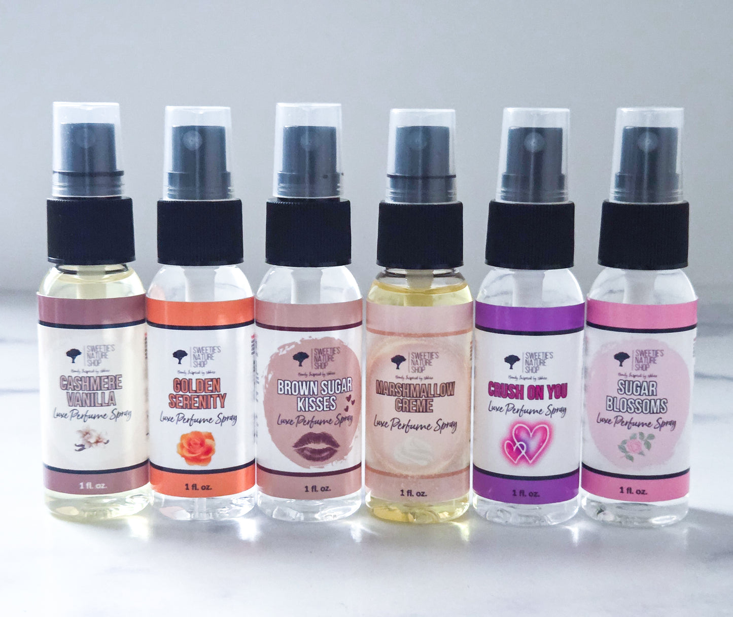 Six perfume spray minis showing options for the discovery set.
