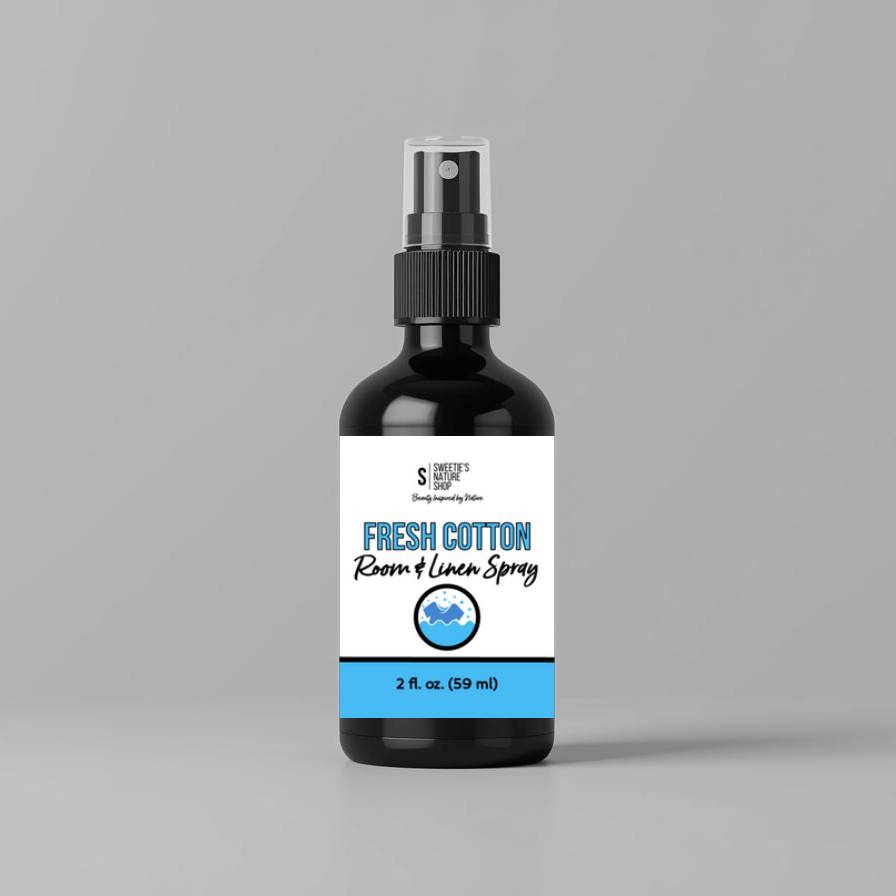 Bottle of Fresh Cotton Room & Linen Spray on a gray background