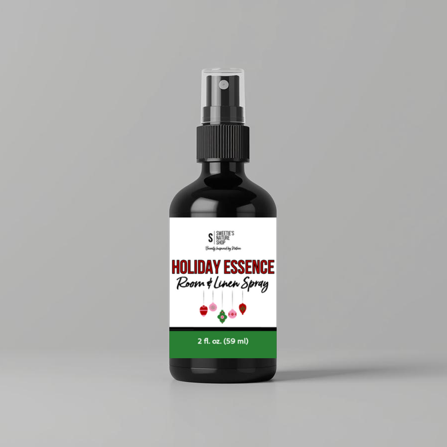 Bottle of 'Holiday Essence' room & linen spray on a gray background