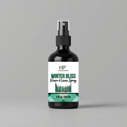 Bottle of 'Winter Bliss' room & linen spray on a gray background