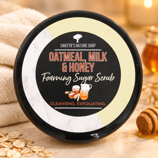 Top-down view of the Oatmeal, Milk & Honey Foaming Sugar Scrub jar lid with the label visible